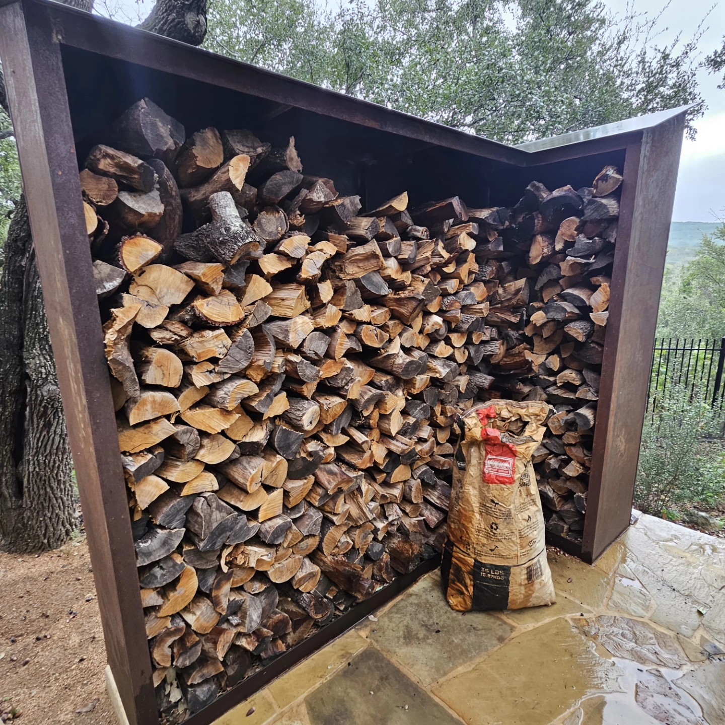 Stacked firewood for smoking